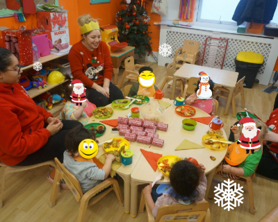 nursery-children-enjoying-christmas-dinner
