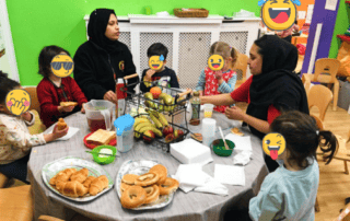 Freshly prepared breakfast with children and caregivers at Monkey Puzzle Day Nursery Enfield, showcasing a welcoming and educational environment for early childhood development.