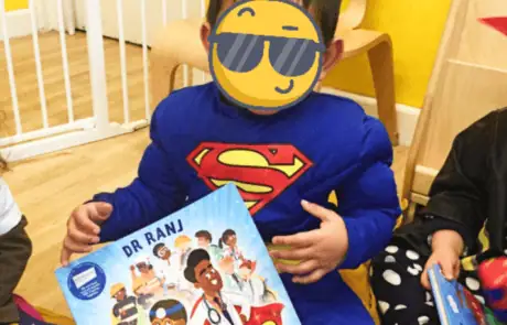 Superhero-themed children's book at Monkey Puzzle Day Nursery Enfield, promoting learning and fun for young kids.