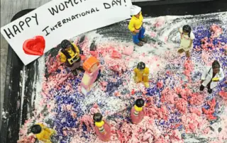 Happy women's international day, celebrating diversity and inclusion at Monkey Puzzle Day Nursery Enfield with children’s creative artwork and festive decorations.
