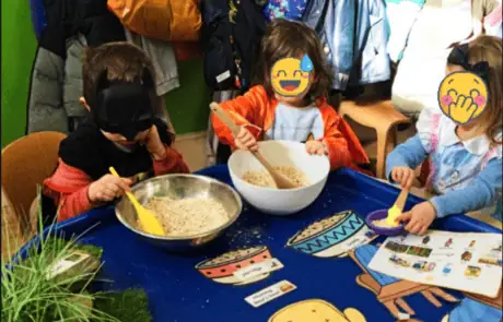 Children engaging in sensory play and learning activities at Monkey Puzzle Day Nursery Enfield, fostering development and creativity in a nurturing environment.