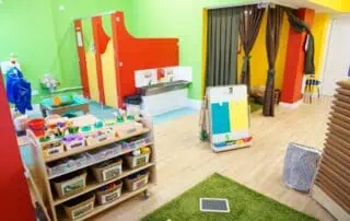 childrens environment Bright and colorful nursery room at Monkey Puzzle Day Nursery Enfield featuring play areas, educational toys, and cozy corners for early childhood development.