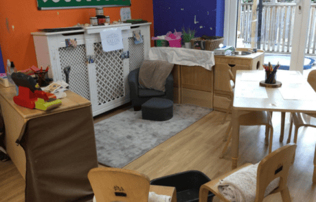 Monkey Puzzle Day Nursery Enfield indoor play area with child-friendly furniture, educational toys, and a safe environment for early childhood development.