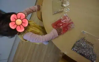 Colorful glitter and craft materials for preschool children at Monkey Puzzle Day Nursery Enfield, fostering creativity and fine motor skills.