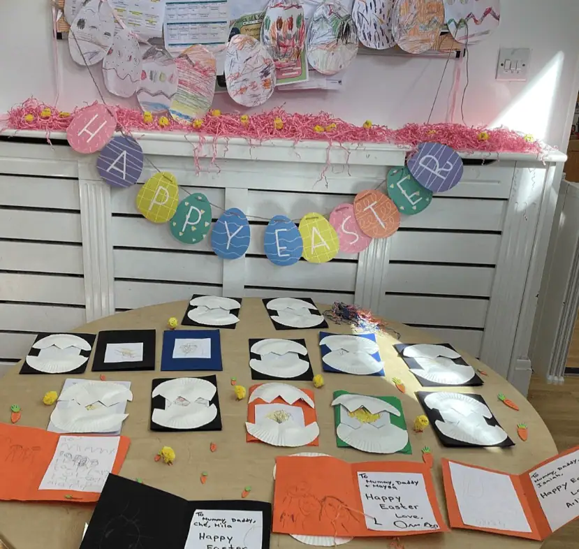 Easter-themed craft display at Monkey Puzzle Day Nursery Enfield, featuring colorful children's artwork and festive decorations, ideal for celebrating holidays with young children.