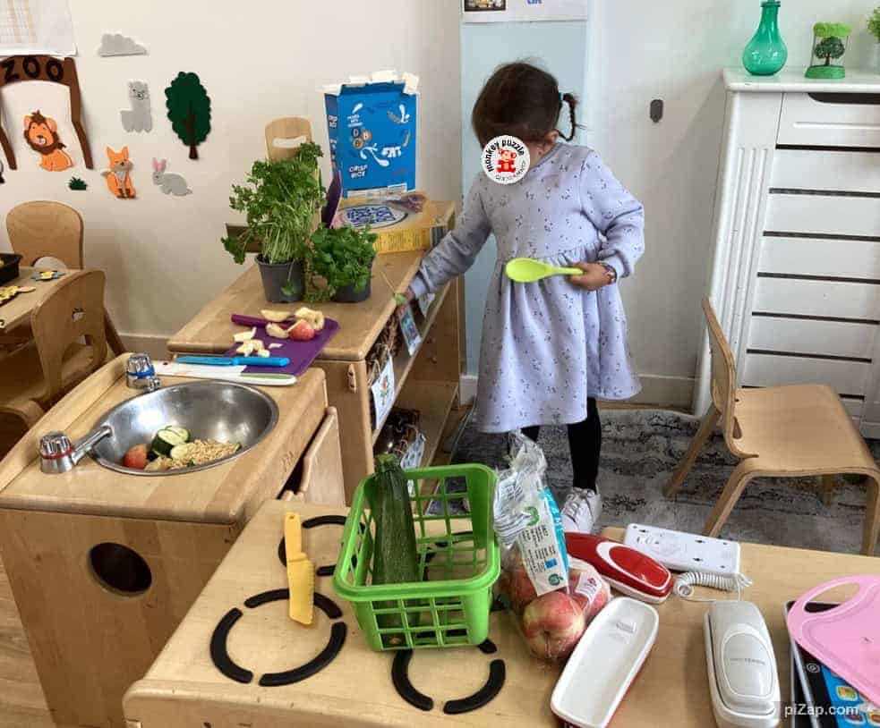 Eating healthy and cooking activities at Monkey Puzzle Day Nursery Enfield, emphasizing early childhood development and hands-on learning in a nurturing environment.